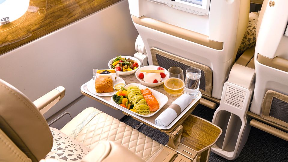 Emirates' premium economy passengers can tuck into 'business class-inspired' meals.