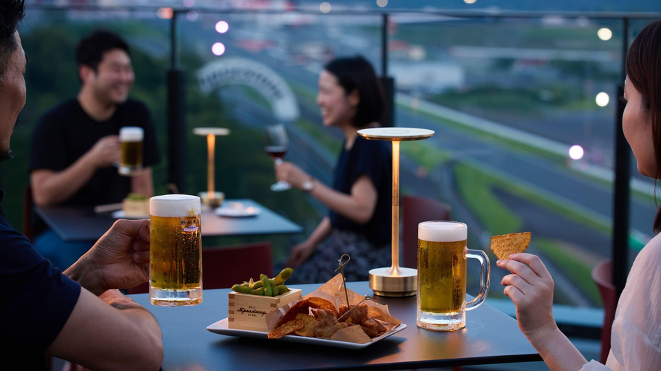 The hotel's rooftop bar offers a birds-eye view of the track.