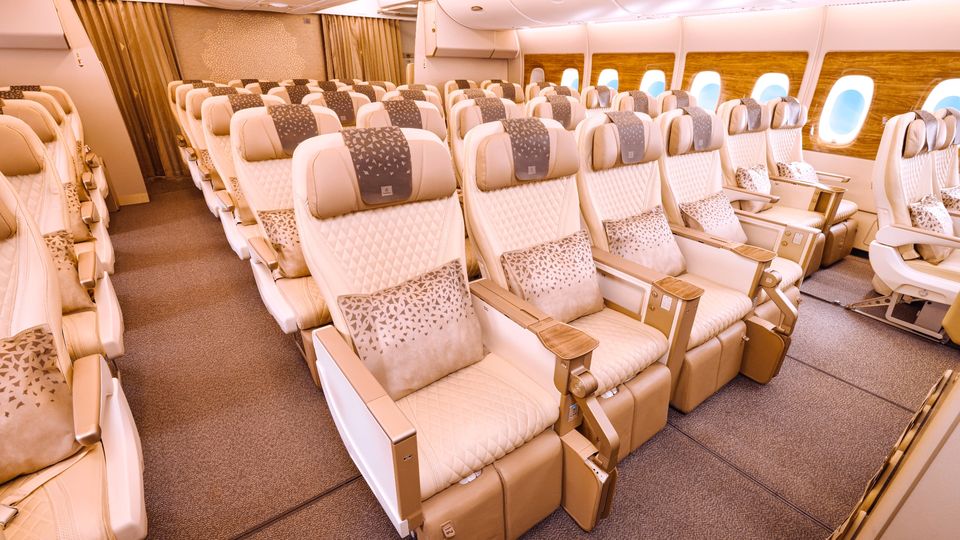 Emirates premium economy has its own cabin.