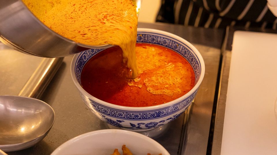 The rich broth of Fatty's nuclear chicken.