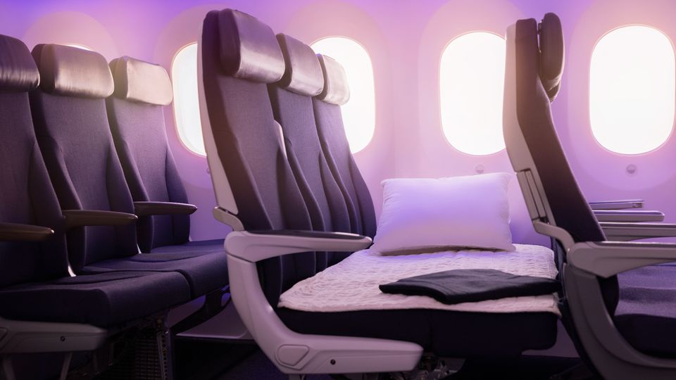 Air New Zealand's innovative Skycouch turns three economy seats into a sofa-bed.