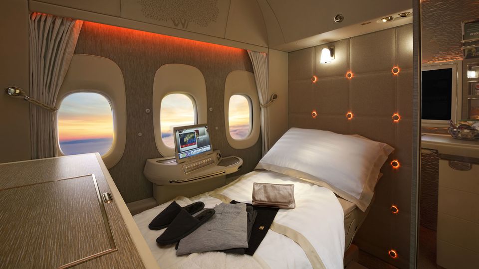 Emirates opted for a chair-turned-bed in first class, rather than separating the two.
