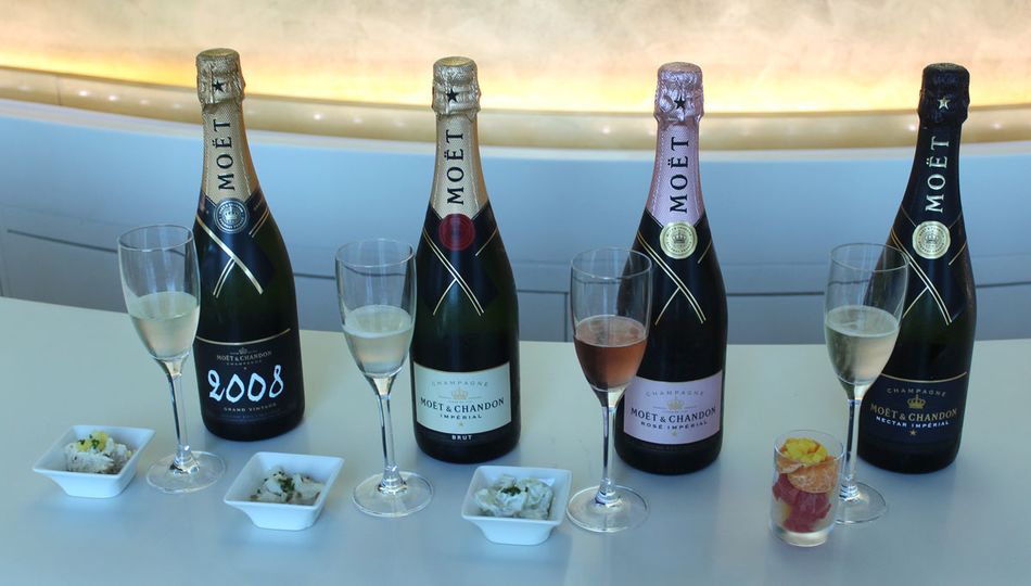 Champagne with matching canapés at Emirates’ business class Champagne Lounge in Dubai