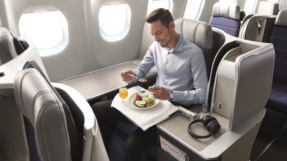 Whether you're up the front or down the back, you'll earn points based on how much you spend.