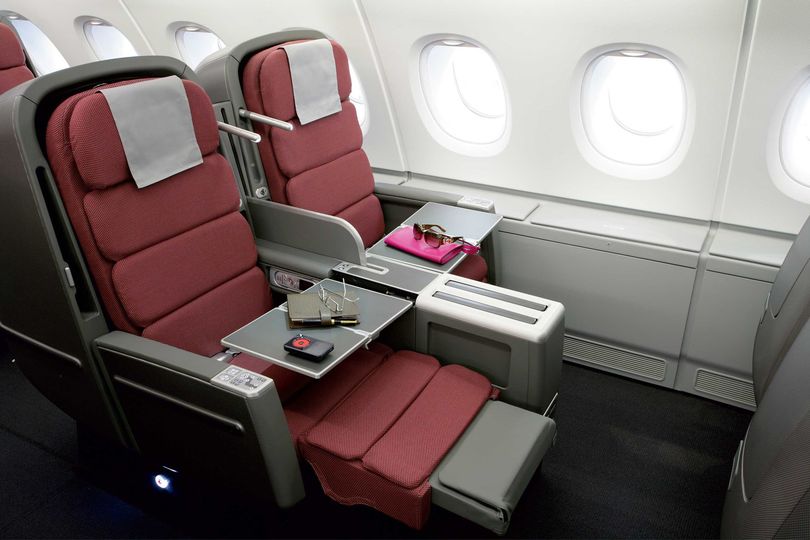The large panel in between the two seats can be raised at the touch of a button.