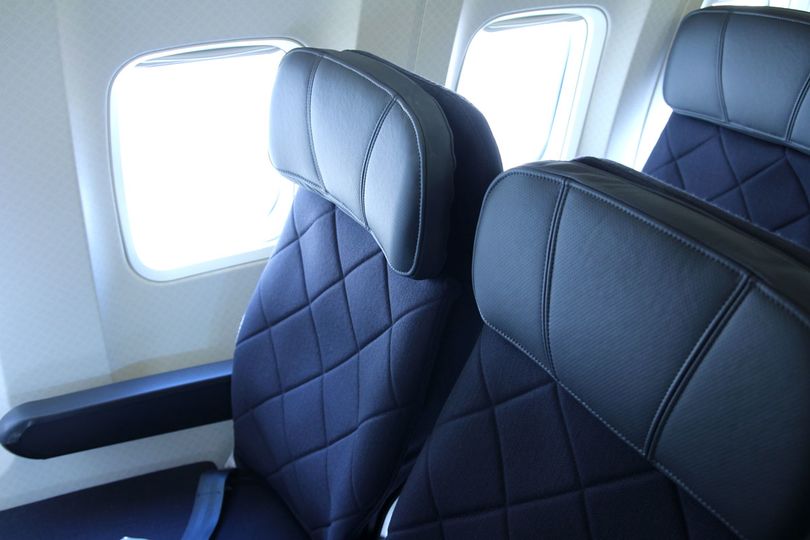 Take your seat in economy, but expect to earn fewer AAdvantage miles...