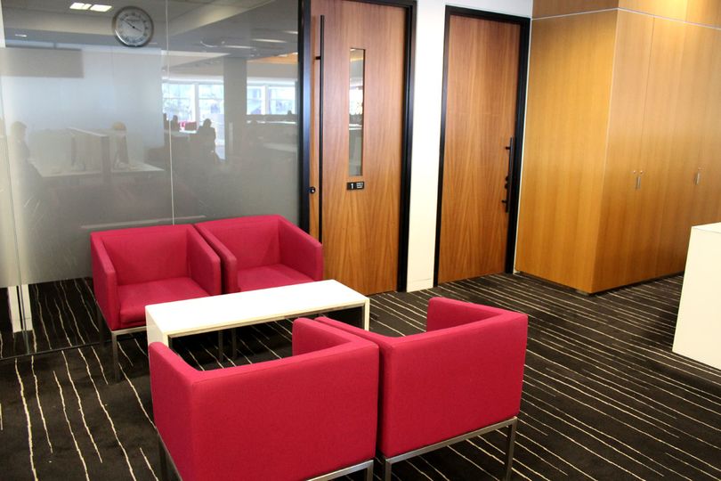 A group of four seats in Brisbane's Qantas Club lounge...