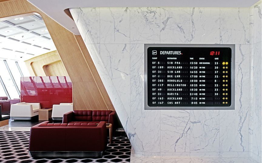 Departure board at the Qantas first class lounge, Sydney
