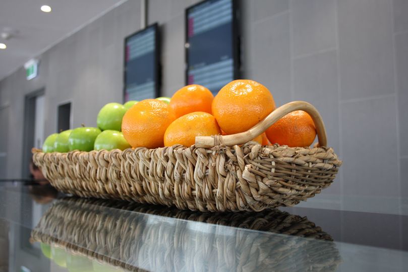 Oranges and green apples, with red apples also available